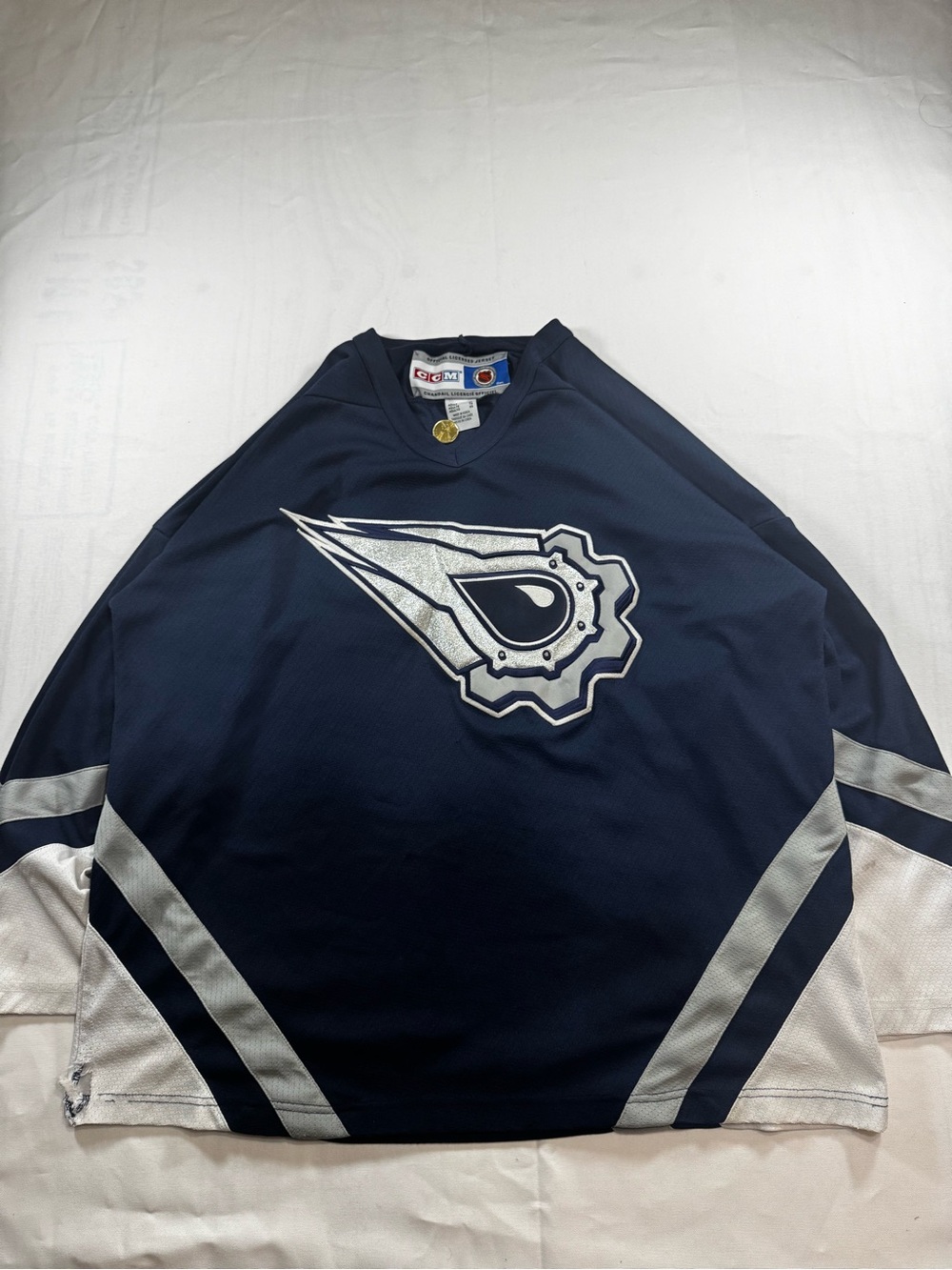 CCM Navy and Silver Hockey Jersey with Gear Logo